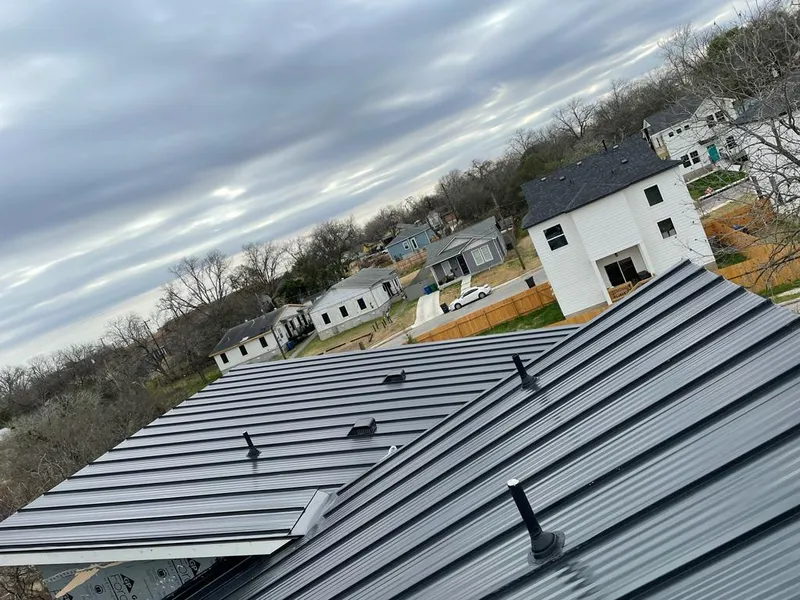 Standing seam metal roof panels with vents for Skylight Repair in Roswell